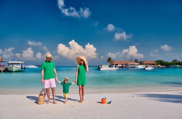 istock Family with three year old boy on beach 1148561942