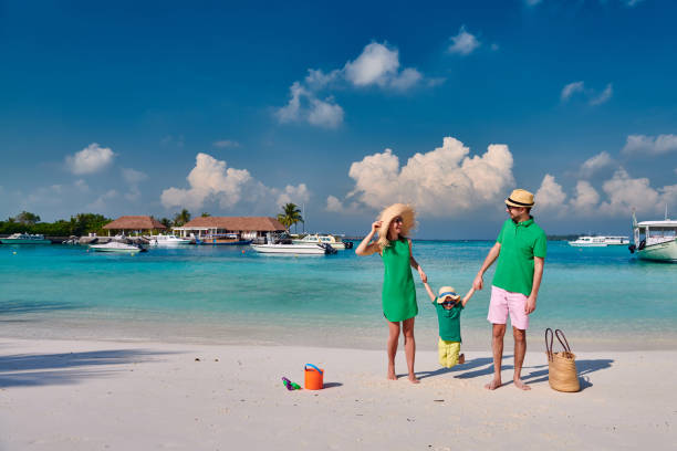 istock Family with three year old boy on beach 1148561963