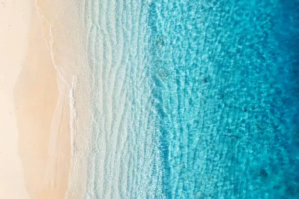 Photo of Beach and ocean as a background from top view. Azure water background from top view. Summer seascape from air. Gili Meno island, Indonesia. Travel - image
