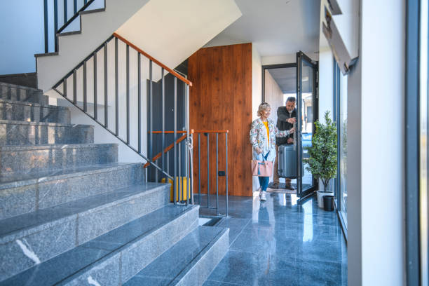 istock Senior Couple Arriving at Vacation Residence 1148563456