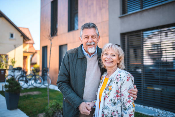istock Relaxed Senior Couple Outside Vacation Residence 1148563462