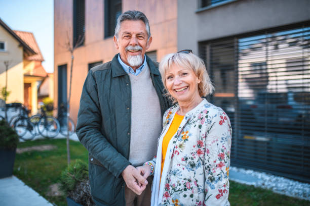 istock Relaxed Senior Couple Outside Vacation Residence 1148563465
