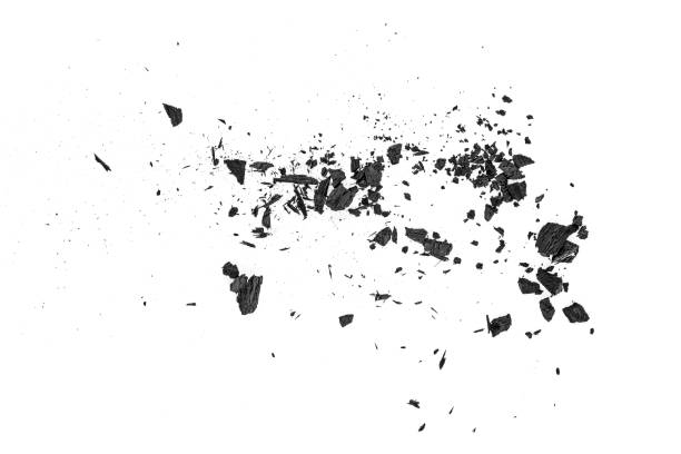 istock Small pieces of charcoal dust on white background, top view. 1148563864