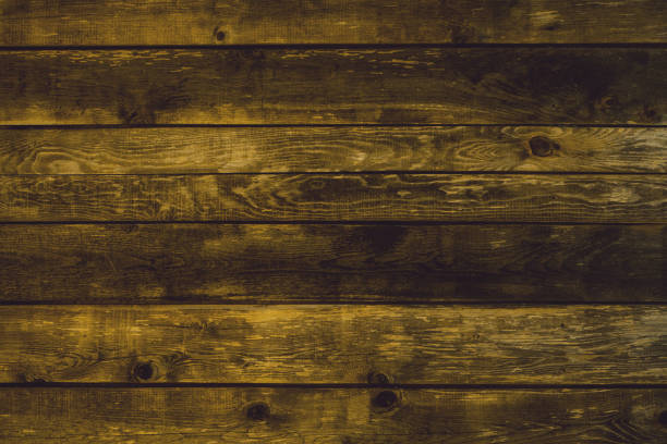 istock dirty yellow wood background 1148565266