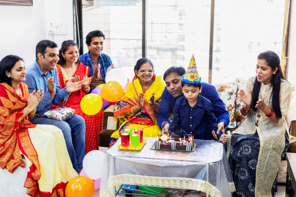 istock Family Celebrating Kid's Birthday 1148565327