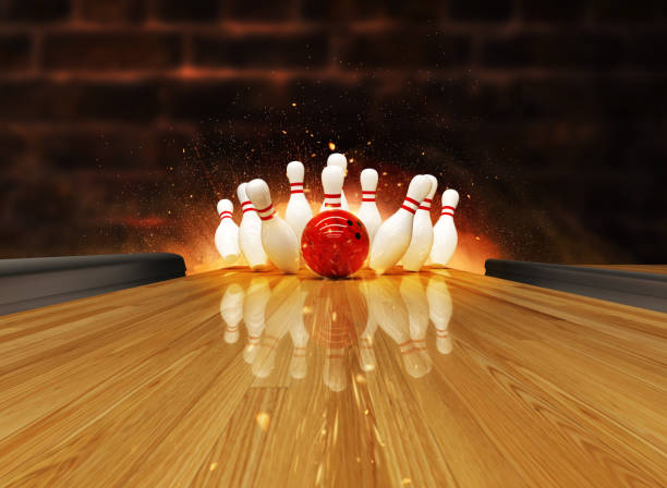 Bowling strike hit with fire explosion Bowling strike hit with fire explosion. Concept of success and win. bowling alley stock pictures, royalty-free photos & images