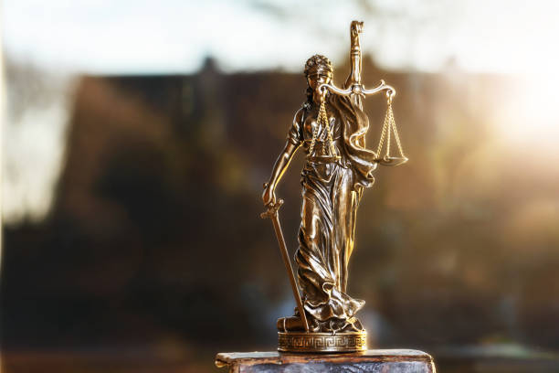 istock The Statue of Justice on defocused background. Selective focus 1148581909