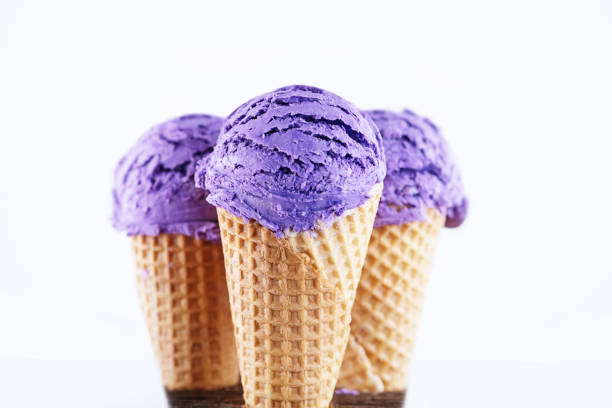 istock Blueberry ice cream with cone isolated on white background 1148582268
