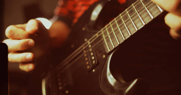 istock Vintage rock guitarist playing guitar 1148582450