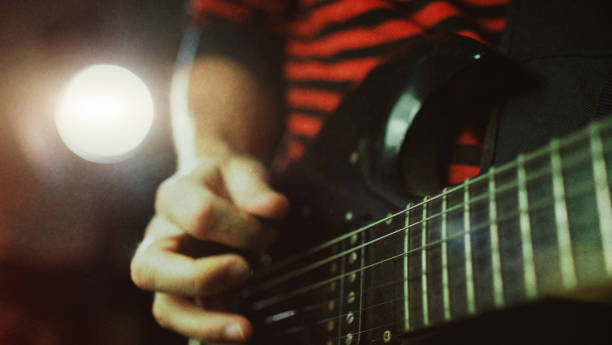 istock Vintage rock guitarist playing guitar 1148582454