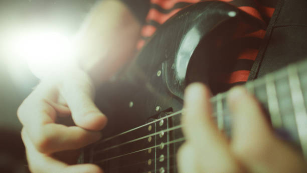 istock Vintage rock guitarist playing guitar 1148582458