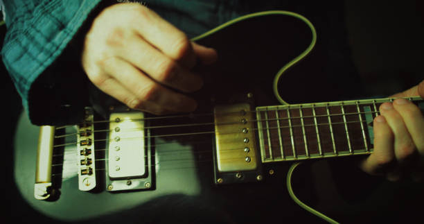 istock Vintage rock guitarist playing guitar 1148582464