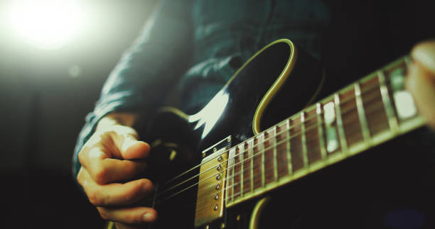 istock Vintage rock guitarist playing guitar 1148582495
