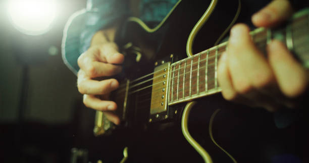 istock Vintage rock guitarist playing guitar 1148582496