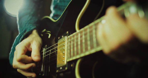 istock Vintage rock guitarist playing guitar 1148582497