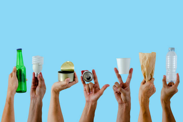 istock Hands holding and show recycle materials on blue background. 1148583471