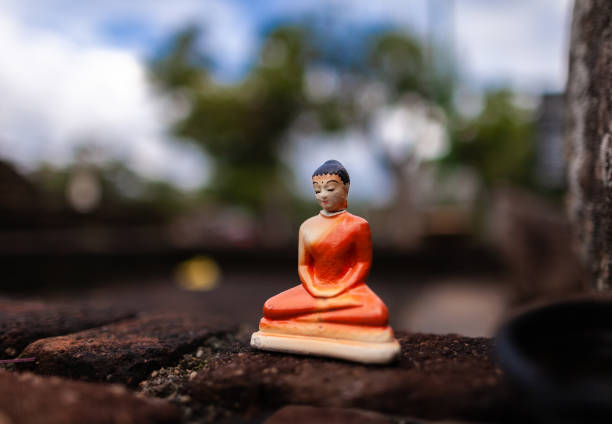 Reclining Buddha statue inside Abhayagiri Dagoba in Anuradhapura, Sri Lanka. Anuradhapura was a major monastery site of Buddhism and is one of the most extensive ruins in the world