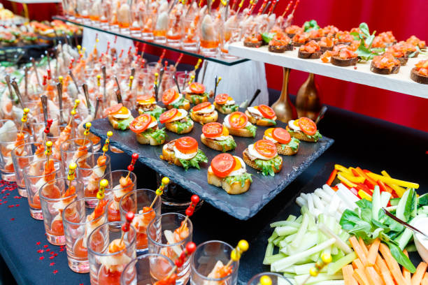 istock appetizers on skewers, desserts. fruit smoothie. Salads. Snacks. Buffet 1148584886