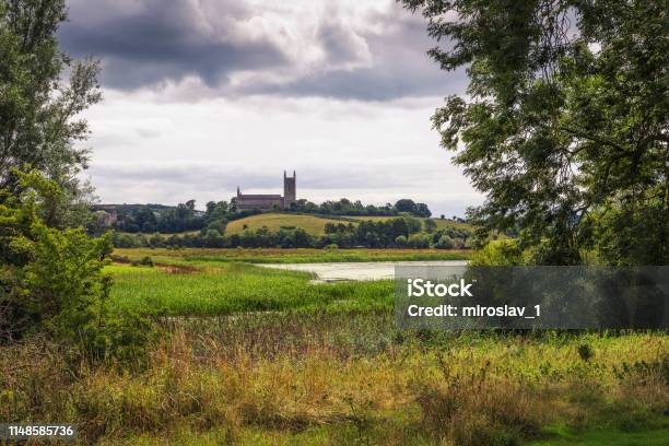 Quoile River And The Mound Of Down Cathedral In Downpatrick Northern Ireland Stock Photo - Download Image Now