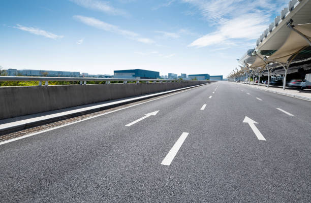 istock Arrow signs on asphalt road 1148587566