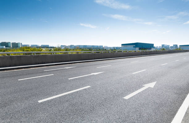 istock Arrow signs on asphalt road 1148588957