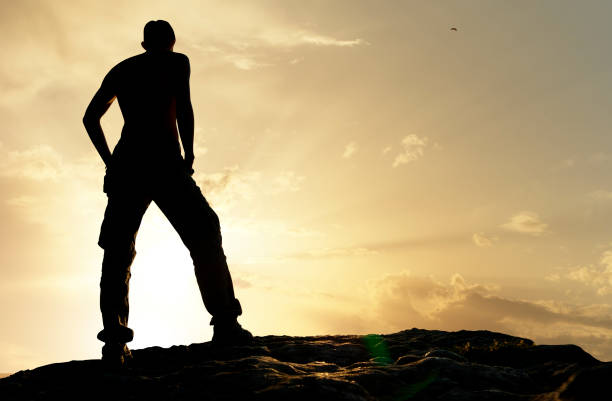 istock Silhouette of man in mountain. 1148589267