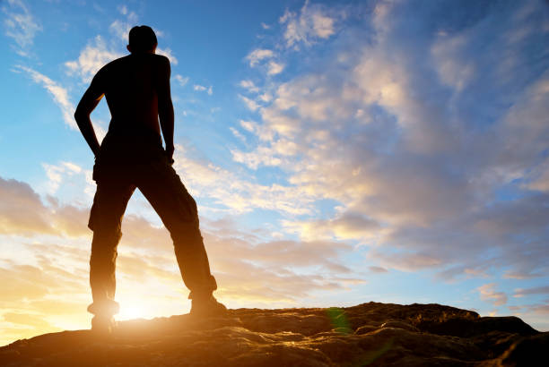 istock Silhouette of man in mountain. 1148589868