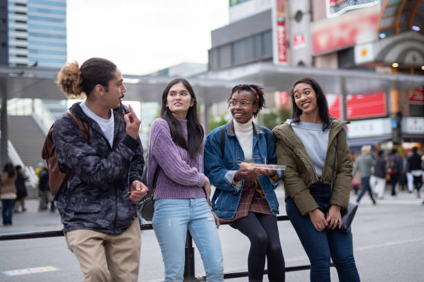 istock Tourist friends talking on street 1148590445