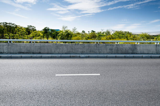 istock Asphalt road and roadside scenery 1148590497