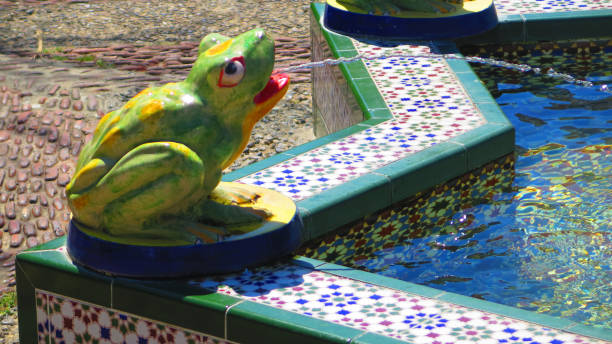 istock Colorful frog spouting water in Tarifa square 1148591602
