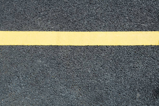 istock Asphalt road with yellow dividing line 1148593059
