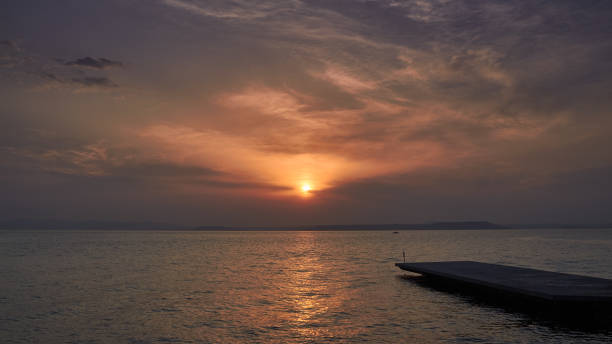 istock Burning sun over the sea 1148593662