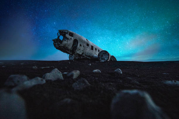 istock Northern lights and old plane crashed in Iceland 1148593865