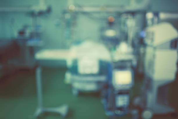 istock Unfocused background with comatose patient in the advanced equipped ICU 1148594004