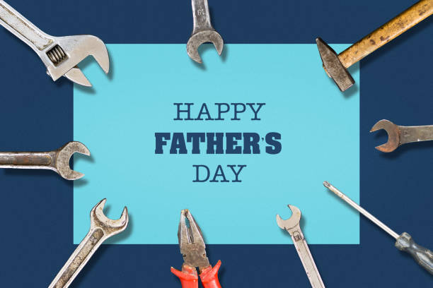 istock Happy father's day background. Different tools on dark background Congratulatory background. 1148596793