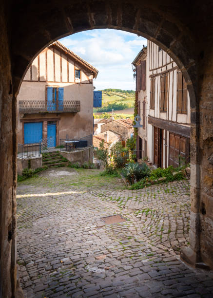 istock Arch framing a medieval village 1148596903