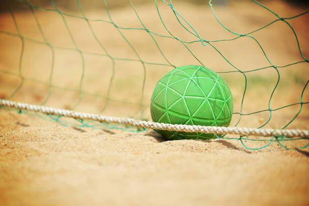 istock Beach handball ball and net 1148603161