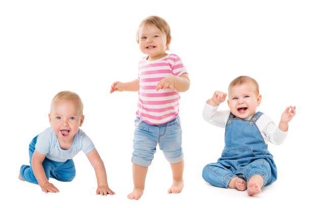 Babies Boys Girls, Crawling Sitting Standing Infant Kids, Growing Toddlers Children on White Babies Boys Girls, Crawling Sitting Standing Infant Kids, Growing Toddlers Children Group Isolated on White Background, One year old 3 6 months stock pictures, royalty-free photos & images