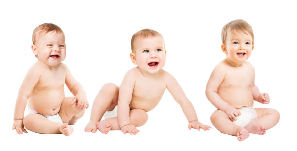 Babies group in Diapers, Happy Infant Kids Boys, Toddlers Children Sitting on White Babies group in Diapers, Happy Infant Kids Boys, Toddlers Children Sitting on White Background, one year old 3 6 months stock pictures, royalty-free photos & images