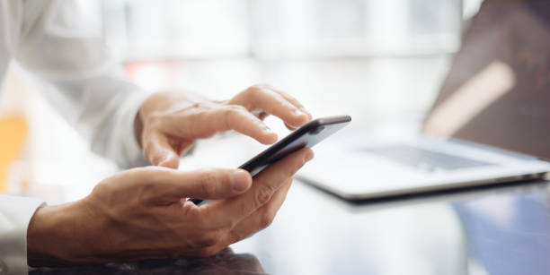istock Male hands with smartphone 1148608199