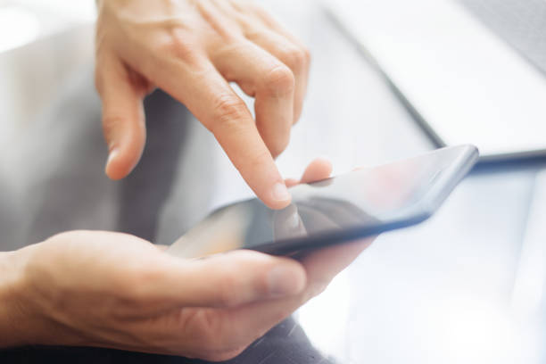 istock Male hands with smartphone 1148608212