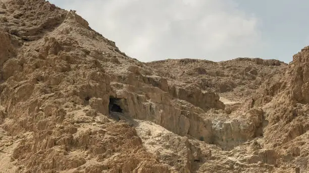 a cave in the hills at qumran where the dead sea scrolls were discovered in israel