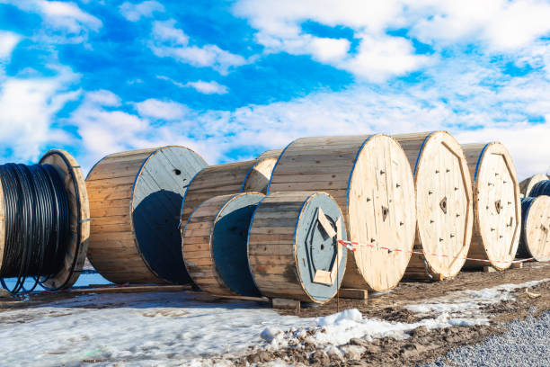istock Wooden coils with a high-voltage cable of various sizes 1148610549