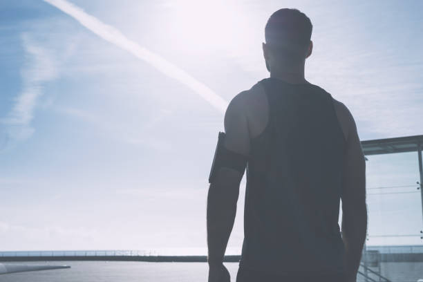 istock Athletic guy who is preparing for outdoor workouts 1148610793