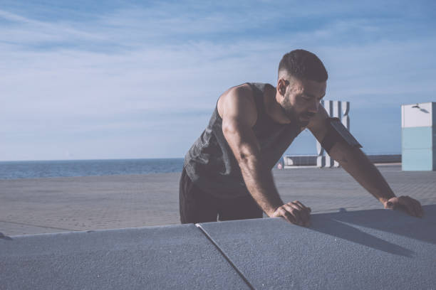 istock Athletic man with a muscular body after jogging 1148610856