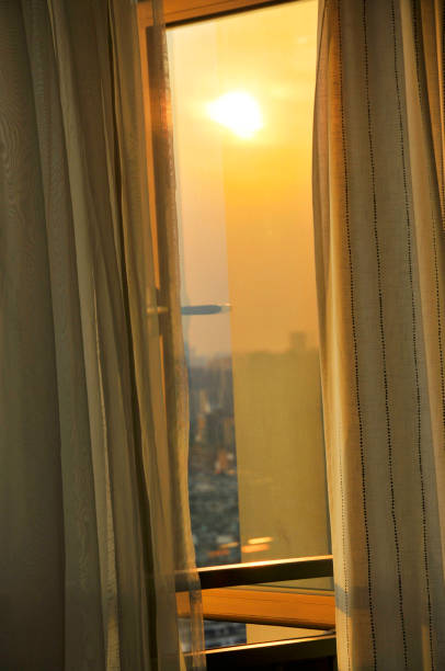 istock Curtain in sunrise background 1148611368