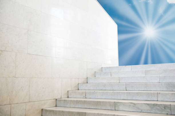 istock Sun shining on sky on marble staircase 1148615969