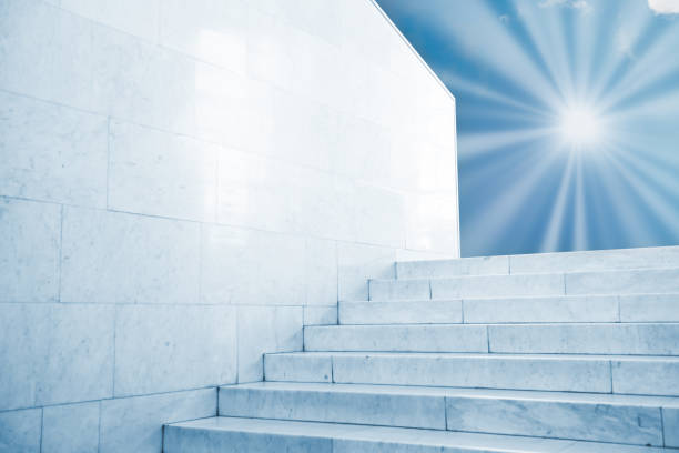 istock Sun shining on sky on marble staircase 1148616004
