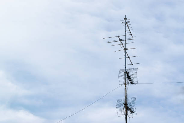 istock A television antenna on the roof under a cloudy sky 1148617518