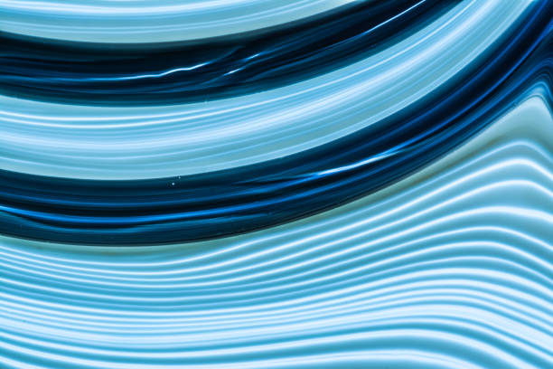 istock Futuristic abstract background of beautiful glowing blue neon geometric lines. 1148621841